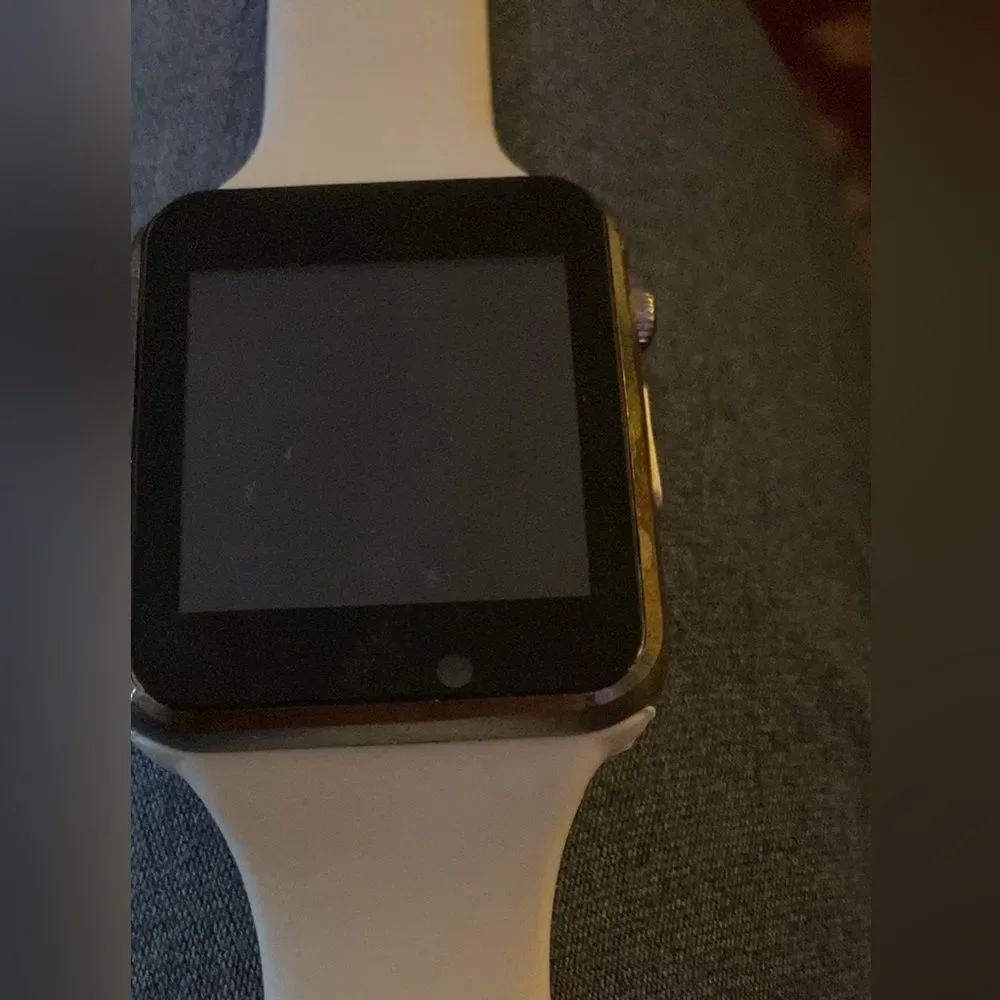 White Smart watch with camera facebook connect, email, text, and music